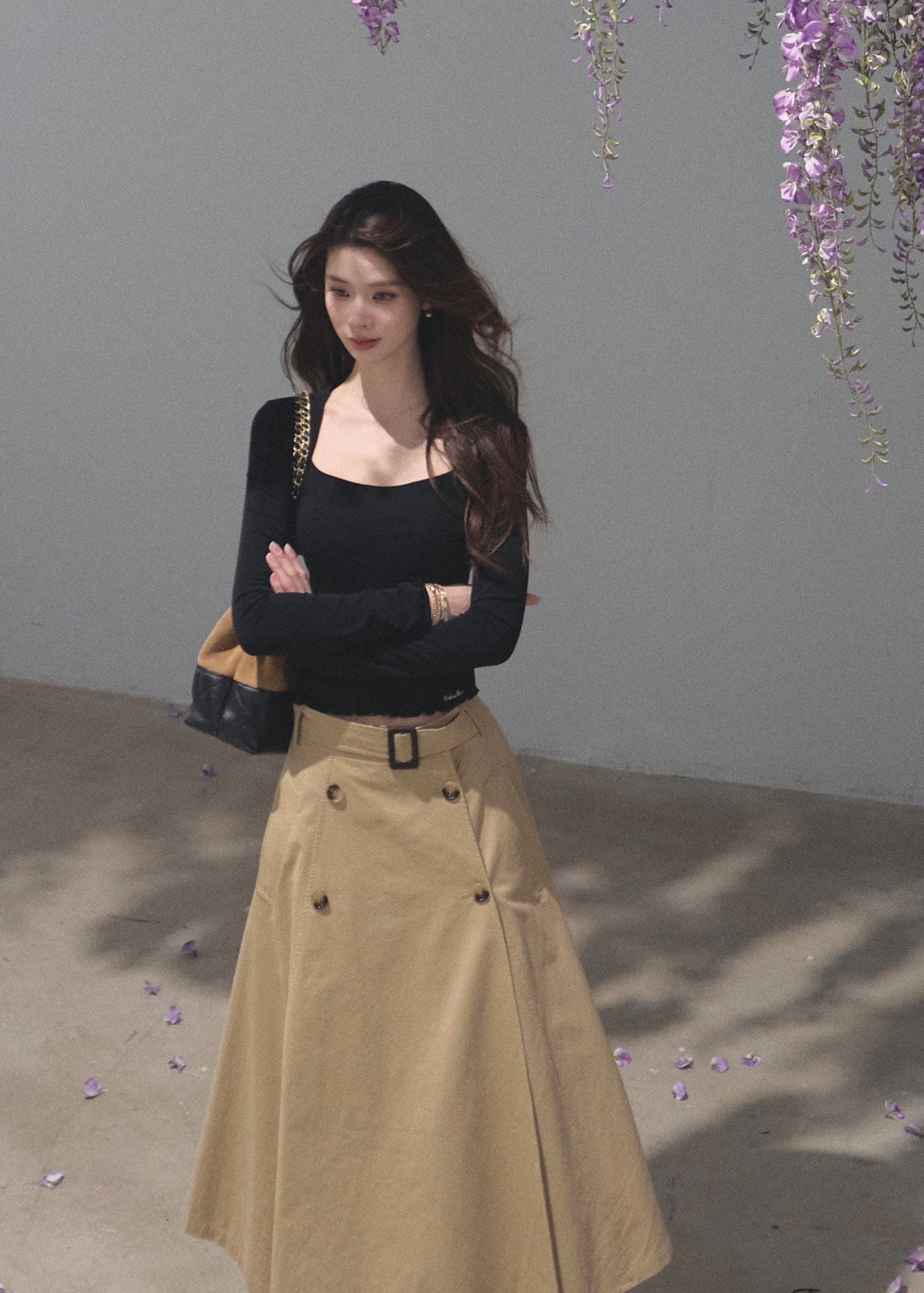 Khaki A-line midi skirt with a coordinating buckle belt
