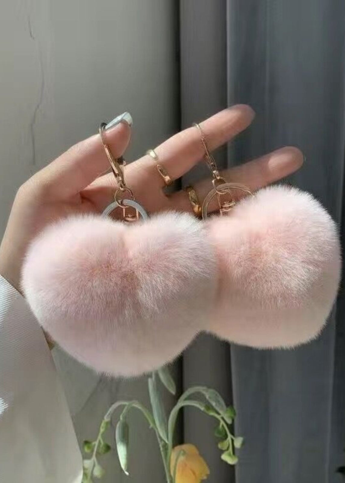 Pink fluffy heart bag charm with gold-tone keyring