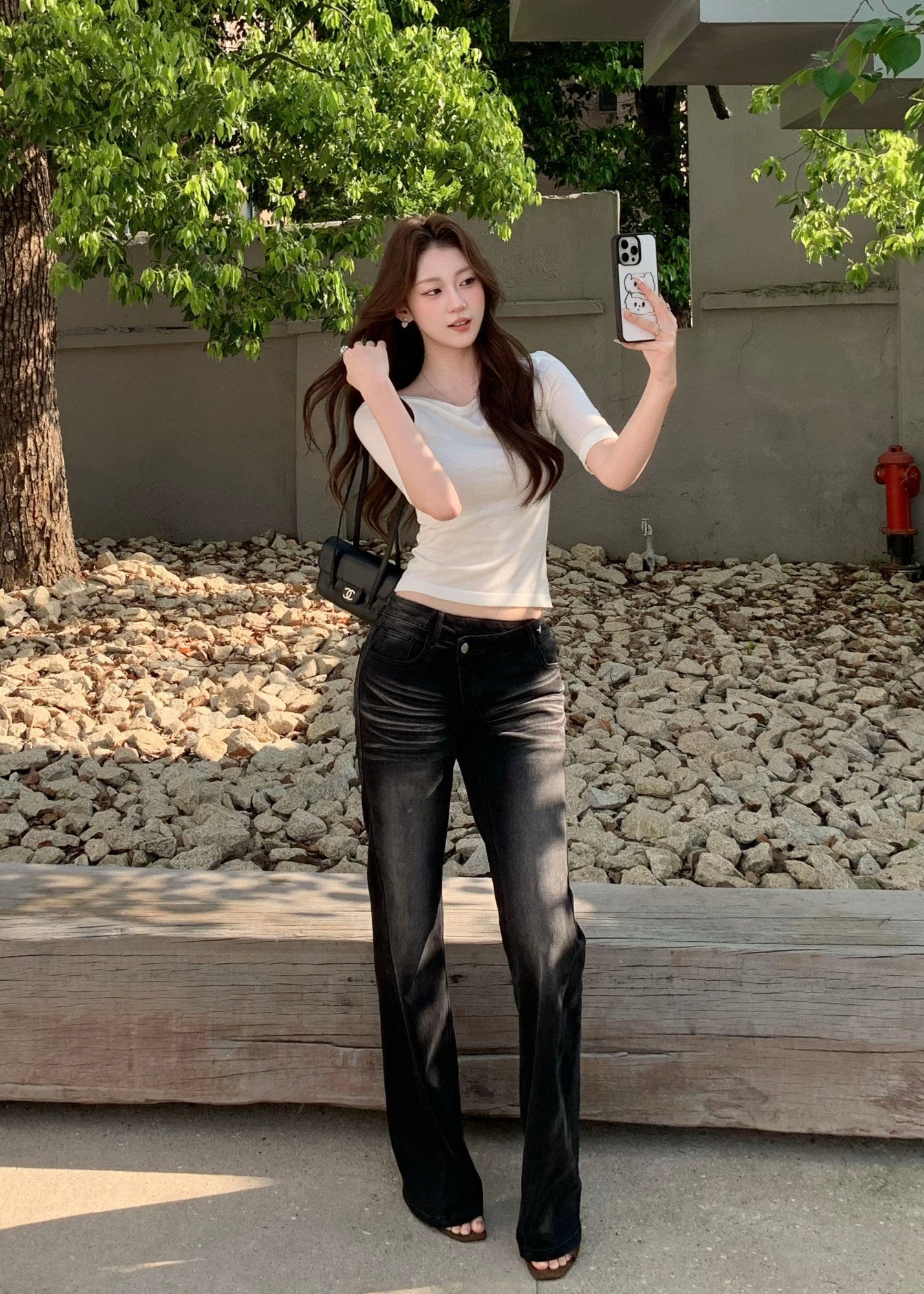 vintage flared jeans, slim flared jeans, women flare denim pants, Korean style jeans, feminine flared jeans, summer denim pants, vintage blue jeans women, black flare jeans women, leg lengthening jeans, slim fit denim trousers, high waist flare jeans, casual chic jeans women, retro flare pants, versatile women jeans, fitted flare denim