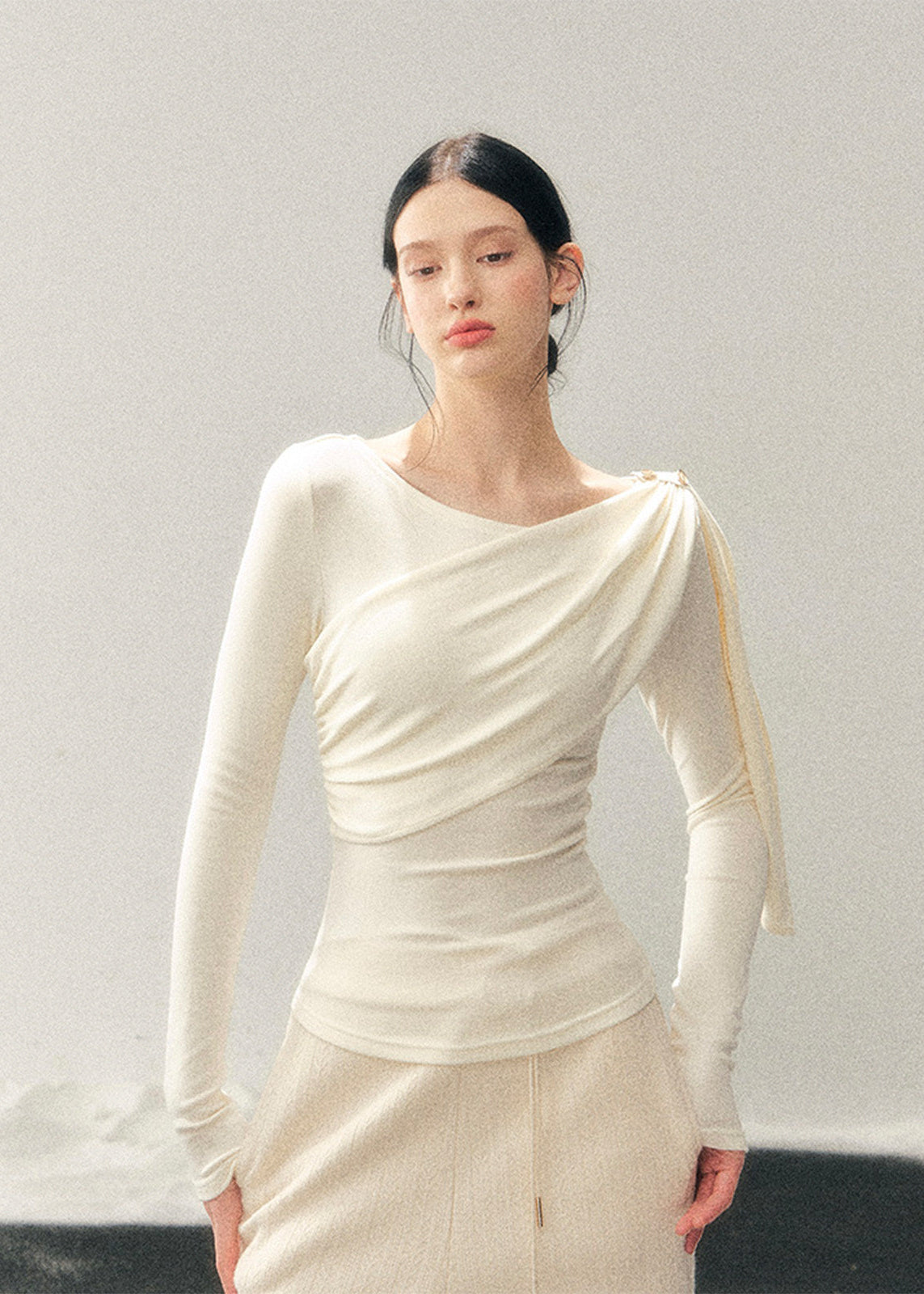 French style knit top, Korean feminine top, one shoulder long sleeve top, draped knit shirt women, winter slim fit top, elegant women knitwear, asymmetrical neckline top, waist slimming top, soft aesthetic fashion, minimal feminine top, Korean winter outfit, French chic clothing, modern women knit top, layering winter top, elegant casual top