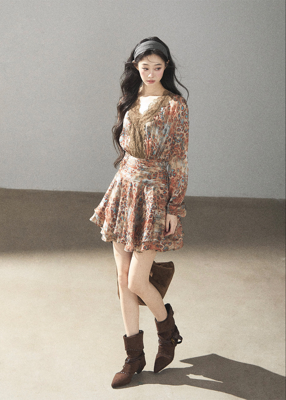Romantic floral dress styled for autumn