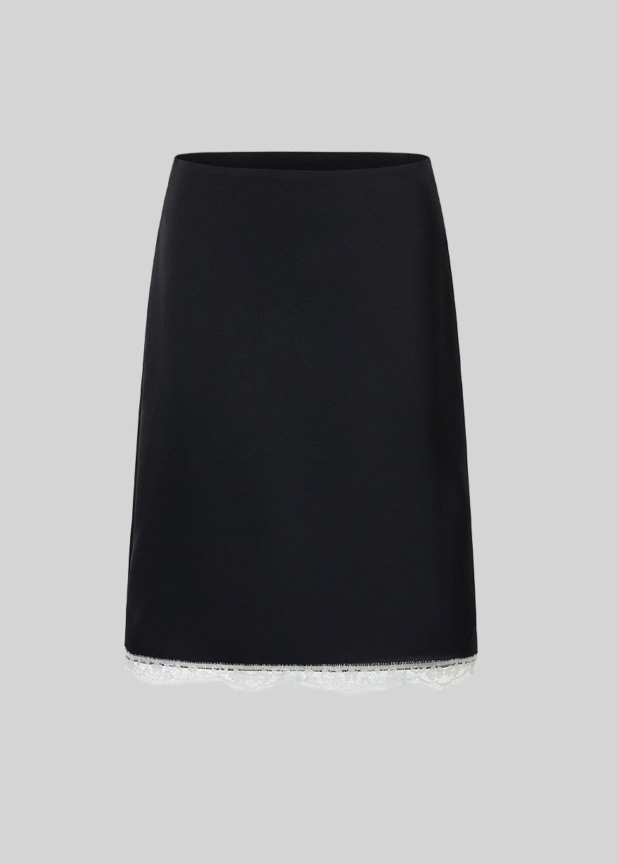 Models wearing pink and black lace-trim camisole and midi skirt sets