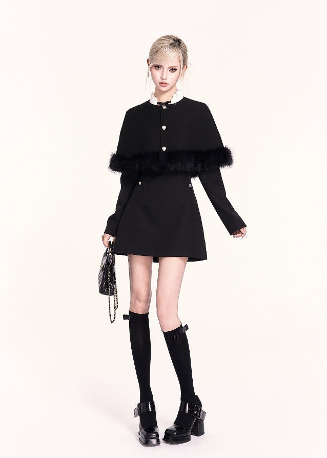 A refined Korean-style holiday dress set featuring a lace-trimmed bow collar mini dress paired with a luxurious woolen cape. The silhouette is soft yet slimming, blending sweet elegance with VOCK’s signature modern edge. Perfect for winter dates, parties, and seasonal photos.
