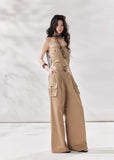 cargo jumpsuit women, strapless jumpsuit women, bandeau jumpsuit, utility jumpsuit women, wide leg jumpsuit women, summer jumpsuit outfit women, beige jumpsuit women, modern minimal outfit women, street style jumpsuit women, fashion forward jumpsuit, elevated casual outfit women, one piece outfit women, trendy cargo outfit women, chic summer jumpsuit, stylish utility outfit