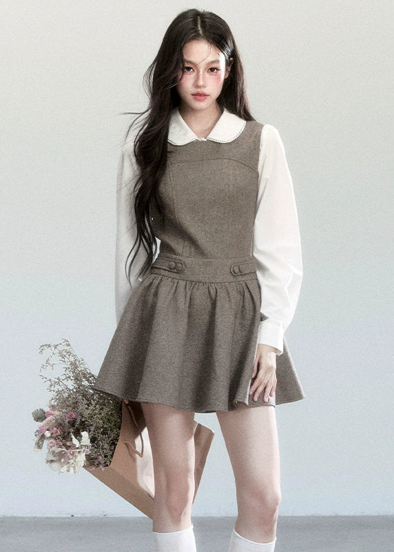 Fragileheart vest dress set, doll collar blouse, luxury Korean fashion, elegant autumn outfit, quiet luxury womenswear, pastel noir aesthetic, preppy Korean fashion, taupe layered dress, K-fashion 2025, modern feminine look, romantic school style, soft brown dress outfit, delicate preppy outfit, refined fall fashion
