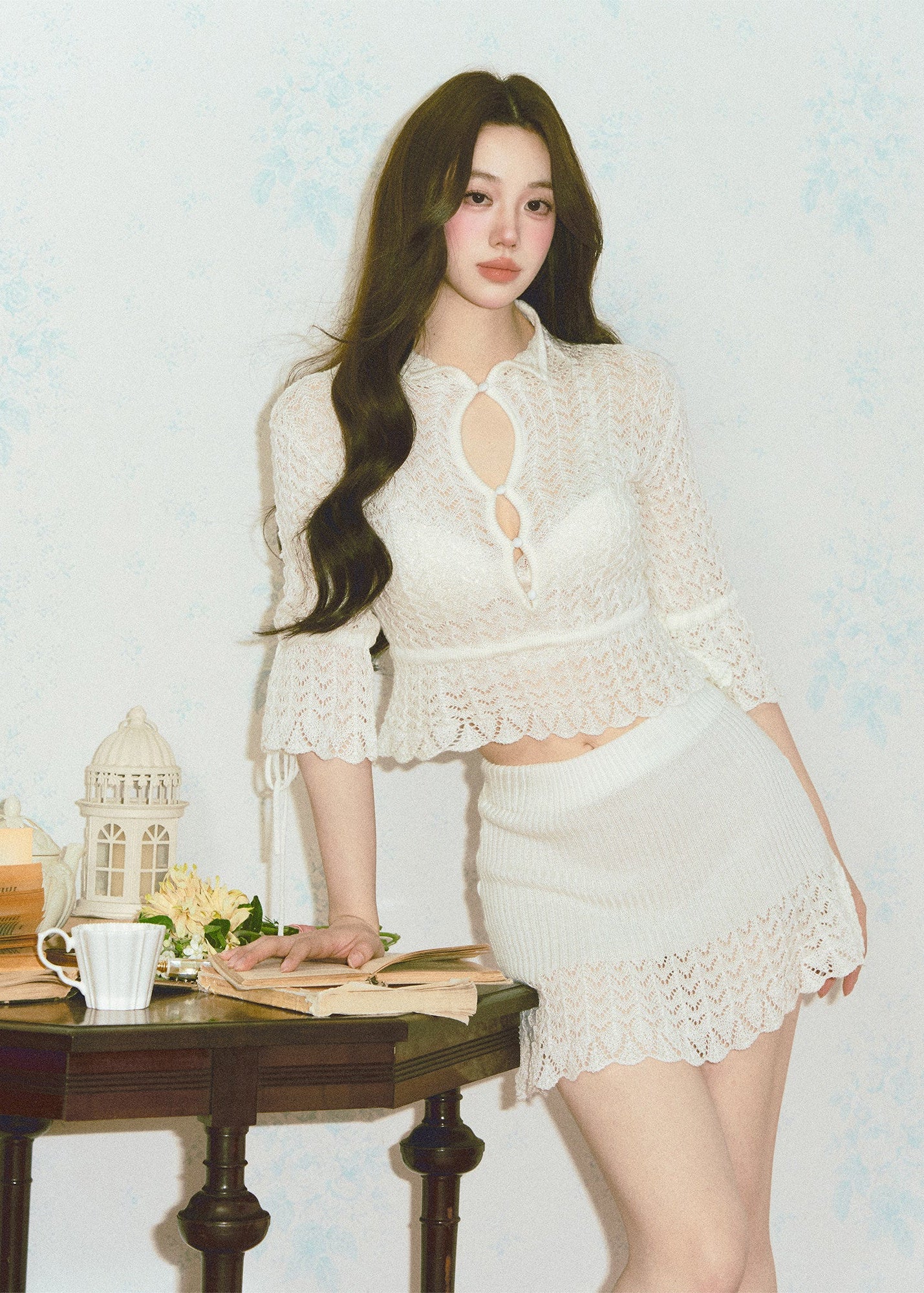 hollow knit top and skirt set, French knit skirt set, feminine Korean two piece set, cream knit mini skirt set, romantic knit outfit women, soft knit matching set, slim fit top and skirt set, elegant mini skirt set, dressy knit co-ord women, cute Korean skirt set, date outfit two piece set, soft cream knit set, fitted knit top women, feminine coordinated outfit, LaLuneDuCiel style clothing