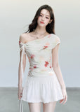 fragileheart set, floral mesh top, cross shoulder top, korean feminine set, summer flower outfit, printed mesh top, mini skirt set, soft girl summer outfit, korean summer fashion, floral two piece set, feminine vacation outfit, romantic mesh top