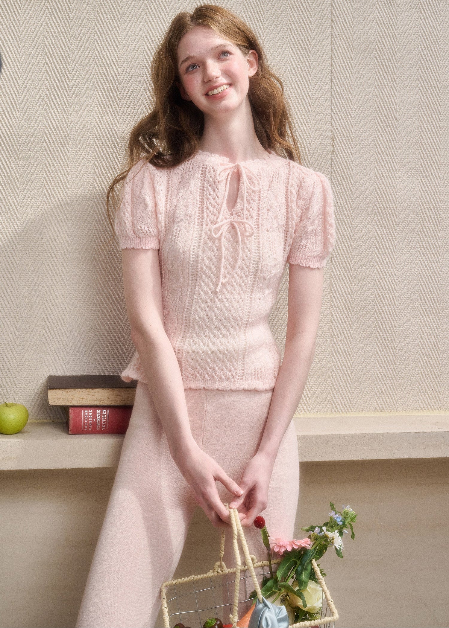 Feminine short sleeve knit top with bow ties