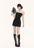 Black mandarin-collar bolero layered over a floral mini dress