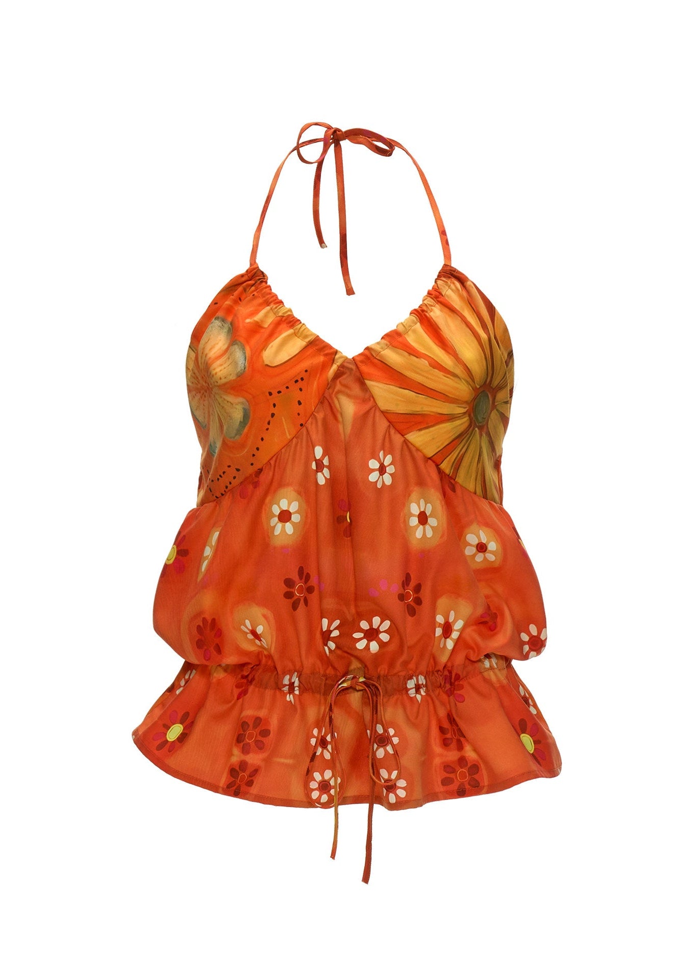 Orange printed summer top styled with brown boots and shorts