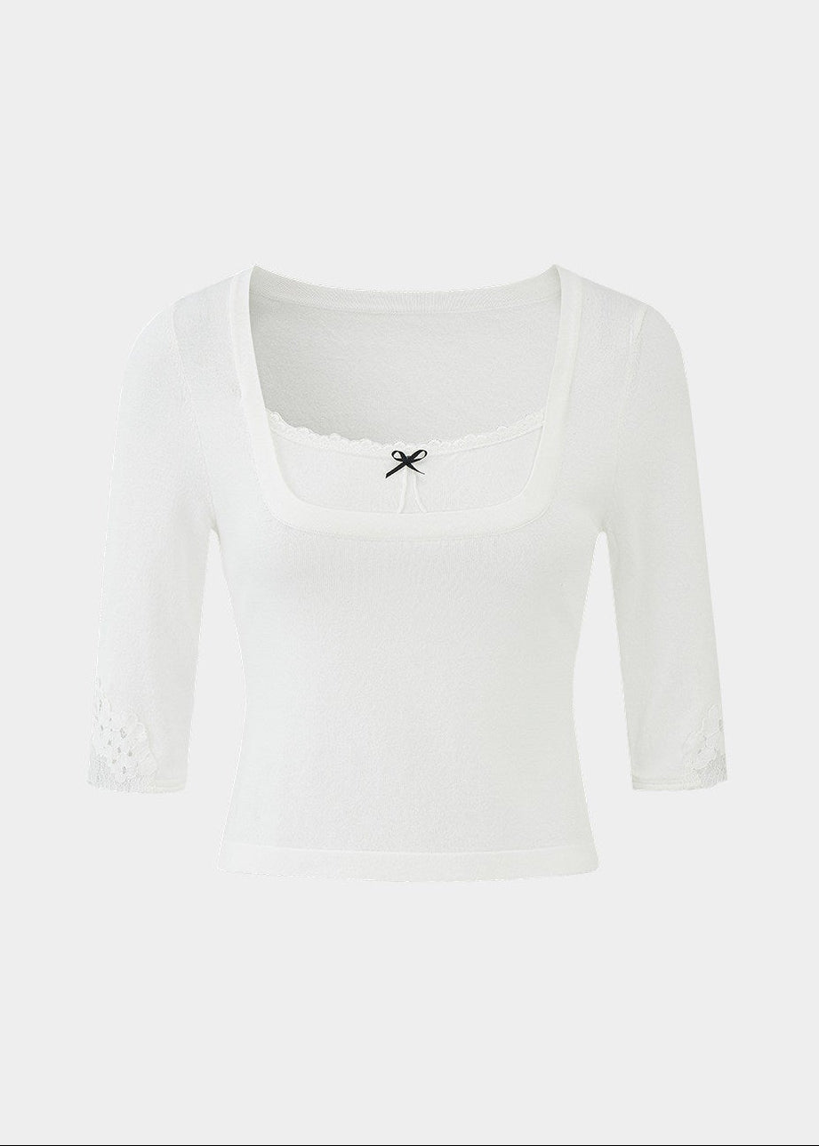 square neck knit top, lace trim top women, korean fashion top, slim fit knit top, spring outfit ideas, half sleeve knit women, feminine casual top, lightweight knitwear, aesthetic fashion top, modern feminine clothing, versatile everyday top, parisian style clothing, fitted knit blouse, soft knit top women, chic everyday outfit, clean line top, refined casual wear, delicate detail knit, spring wardrobe essential, minimal feminine top