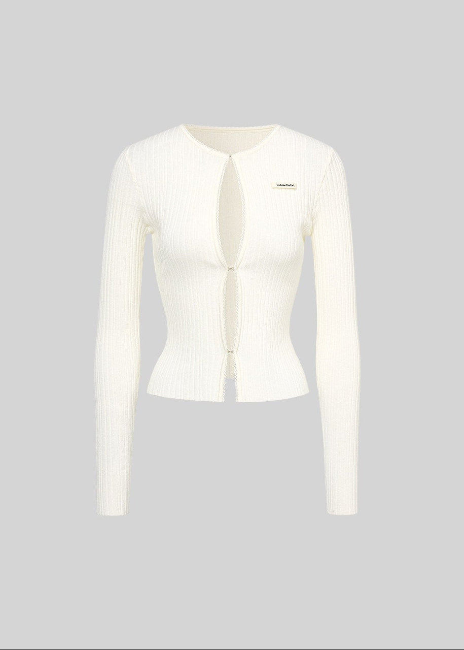 Black knit cardigan set with a matching camisole and flared mini skirt