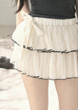Ivory chiffon ruffle mini skirt with side bow
