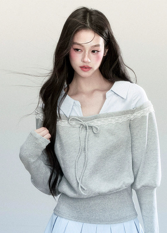 Fragileheart layered set, blue striped pleated skirt, luxury Korean fashion, preppy K-fashion outfit, faux two-piece knit top, quiet luxury womenswear, pastel noir aesthetic, elegant school style, 2025 autumn collection, modern feminine outfit, soft grey sweatshirt set, chic Korean look, academic romantic fashion, delicate layered design
