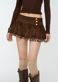 A chic double-layer mini skirt combining soft suede with a subtle peek of leopard print for a playful, stylish edge. The puff silhouette enhances leg lines while keeping the look modern and effortlessly feminine. Perfect for autumn–winter layering and 4muggle’s signature stylish mood.