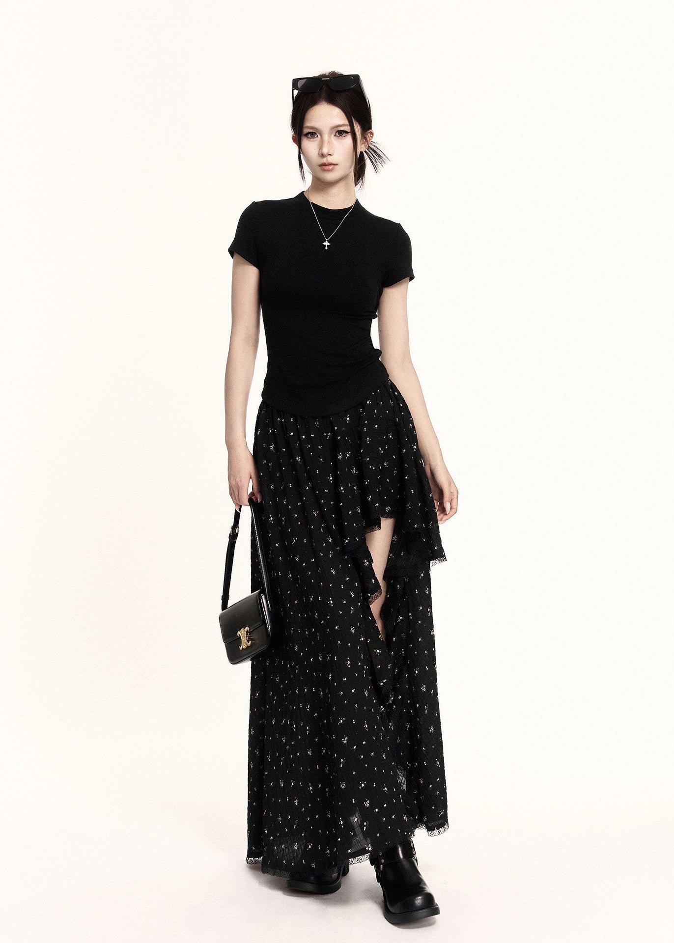 Black high-low ruffle skirt with a sheer layered hem