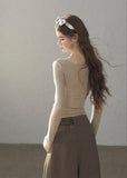 Sheer lace long sleeve top in ivory