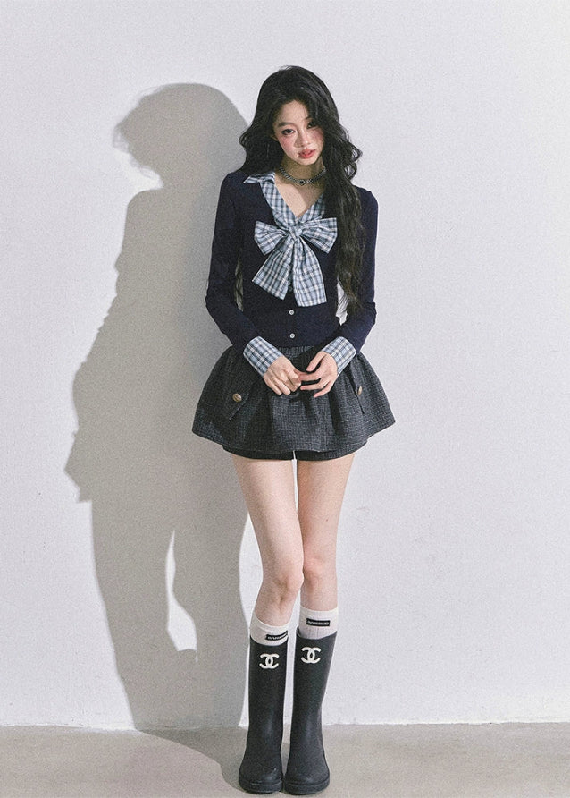 plaid bow top, faux two piece top, layered knit blouse, Korean style bow shirt, American prep knit top, plaid ribbon top, autumn slimming top women, trendy Korean American fashion, cute bow knit, campus girl outfit, elegant faux two piece shirt, plaid bow aesthetic top, boutique bow blouse, prep style knitwear
