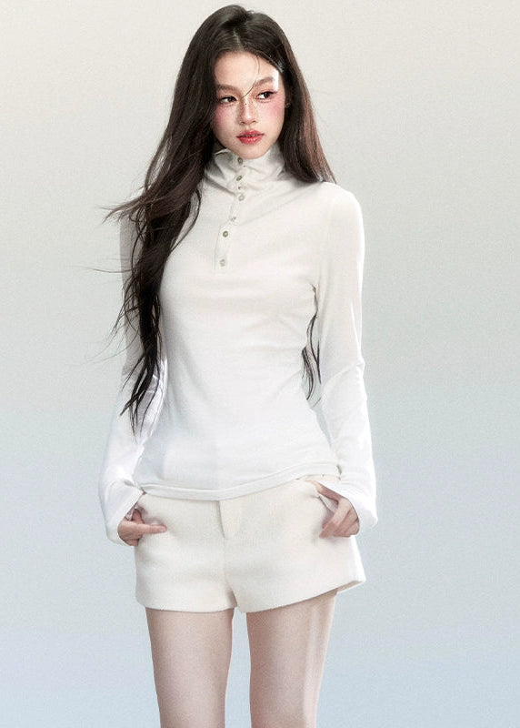Fragileheart turtleneck top, slim long sleeve shirt, minimalist Korean fashion, quiet luxury womenswear, high neck base top, pastel noir aesthetic, elegant winter outfit, ivory and grey knitwear, modern feminine style, K-fashion 2025, chic commuter outfit, soft ribbed turtleneck, refined Korean fashion, luxury basic top
