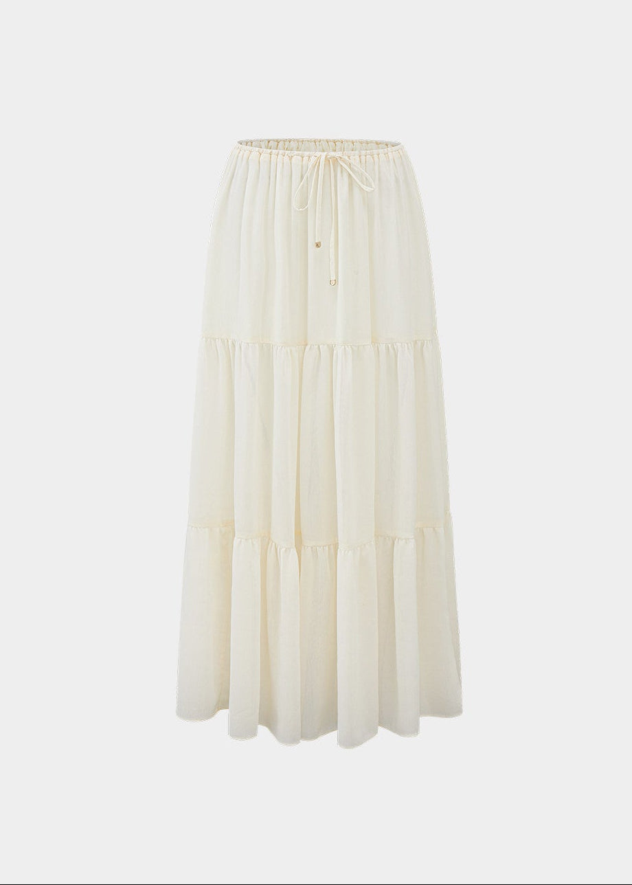 chiffon cake skirt, low rise maxi skirt, resort style skirt, tiered chiffon skirt, feminine Korean skirt, romantic summer skirt, draped long skirt, beach vacation skirt, airy summer skirt, soft chiffon maxi skirt, elegant resort outfit, flowing tiered skirt, Korean feminine fashion, vacation ready skirt, lightweight long skirt