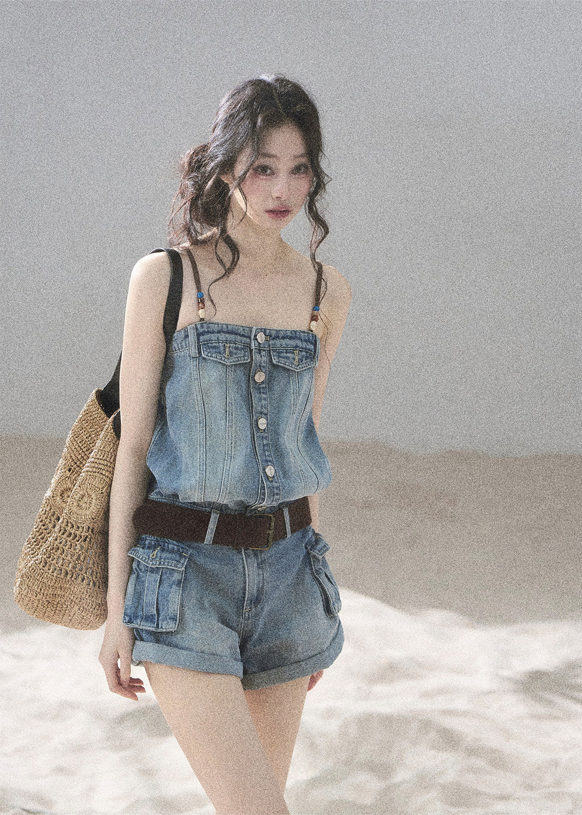 Light wash denim romper with beaded straps