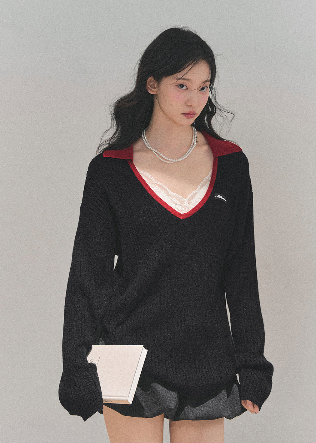 AOMALM sweater, V-neck knit top, college style sweater, Korean fashion sweater, wool knit women's top, winter knit pullover, feminine V-neck sweater, soft wool sweater, black knitted top, winter Korean style outfit, cute warm sweater women, campus style knitwear, deep V-neck pullover, trendy winter tops 2025, elegant knit sweater women, minimal chic sweater, soft warm knit top.