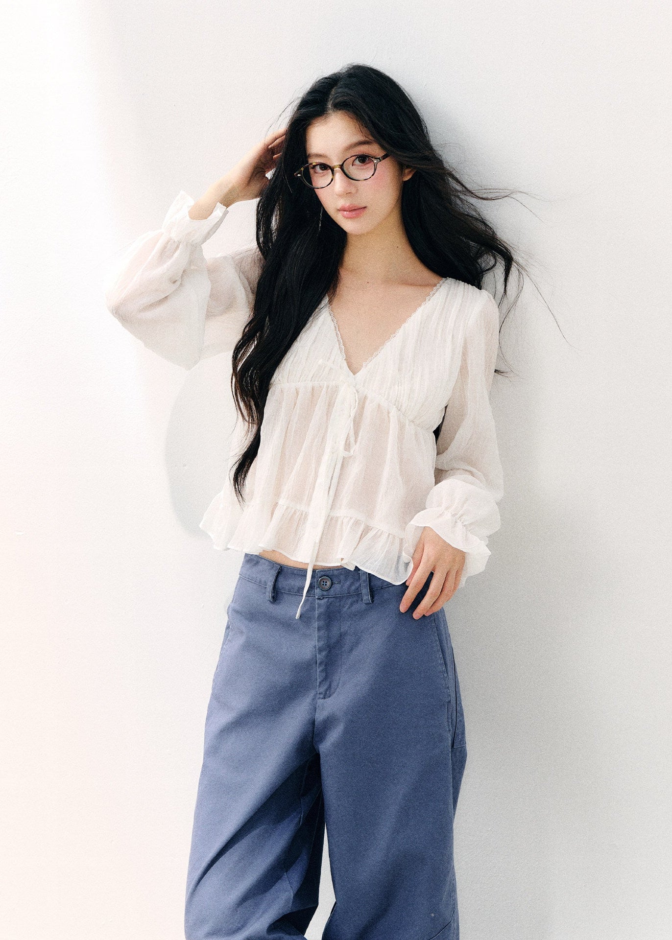 Pale yellow V-neck blouse with double-layer ruffles