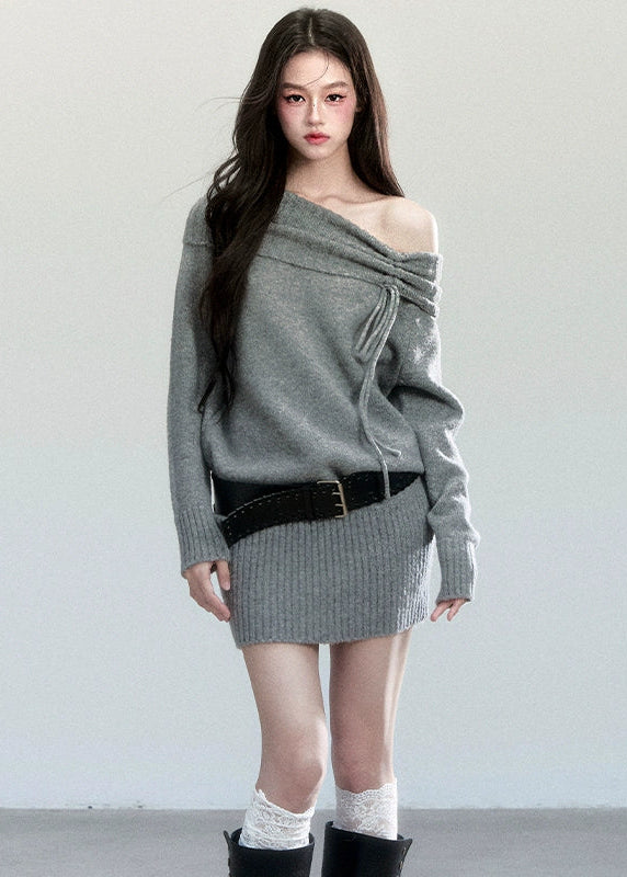 Fragileheart knit dress, off-shoulder wool dress, luxury Korean fashion, quiet luxury womenswear, grey sweater dress, pastel noir aesthetic, autumn knit outfit, elegant minimalist style, K-fashion 2025, refined feminine silhouette, soft draped neckline dress, cozy chic outfit, modern Korean fashion, sophisticated knitwear dress
