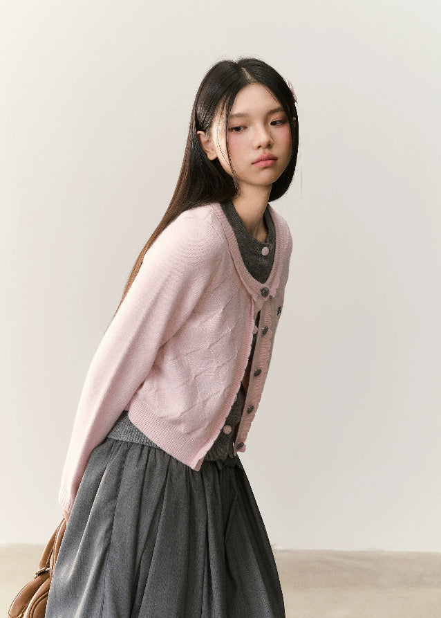 soft pink cardigan, quilted knit cardigan, Korean girly fashion, AW knitwear, layered cardigan set, feminine Korean style, umoumo aesthetic, soft cozy knit, pastel knitwear, grey inner knit top, cute layered outfit, autumn winter Korean style, cropped cardigan look, warm girly sweater, Fragileheart soft mood, sweet soft pink knit, Korean chic outfit, double-layer knit cardigan, girly pastel knit