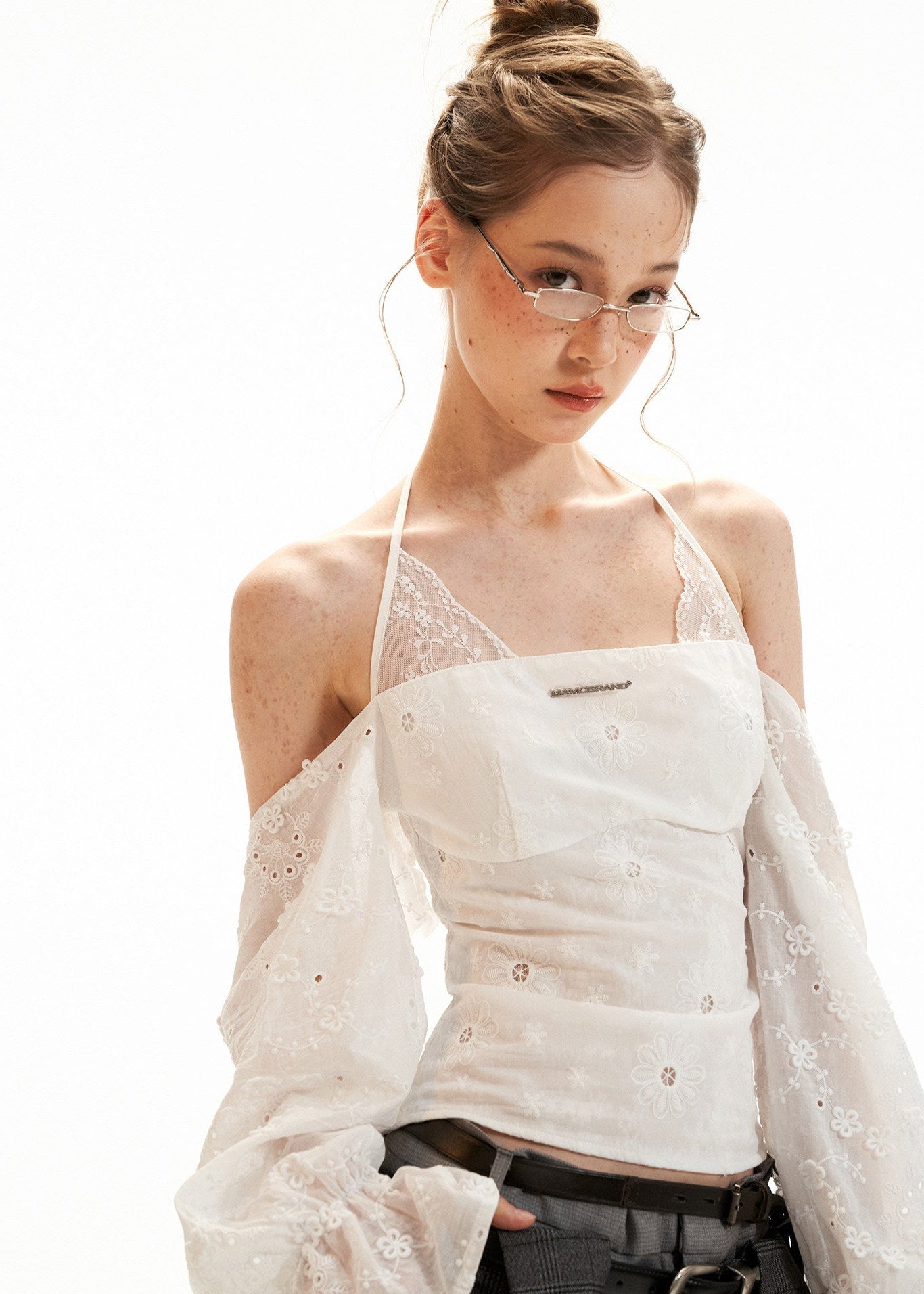 White off-shoulder halter top with flared sleeves