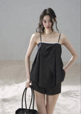 Women’s black two-piece summer set with an asymmetric folded top
