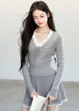 Fragileheart knit skirt set, lace V-neck sweater, pleated mini skirt outfit, luxury Korean fashion, quiet luxury womenswear, pastel noir aesthetic, elegant pre-autumn outfit, grey two-piece knit set, romantic feminine fashion, K-fashion 2025, vintage-inspired knitwear, soft Korean fashion, delicate pleated skirt look, refined knit coordination
