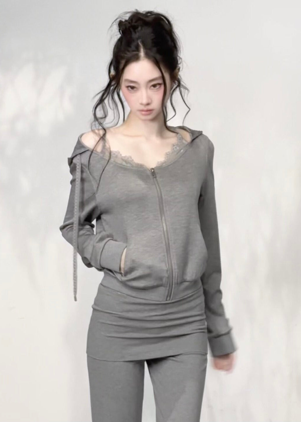 Women's cropped zip hoodie with delicate lace detailing and pockets