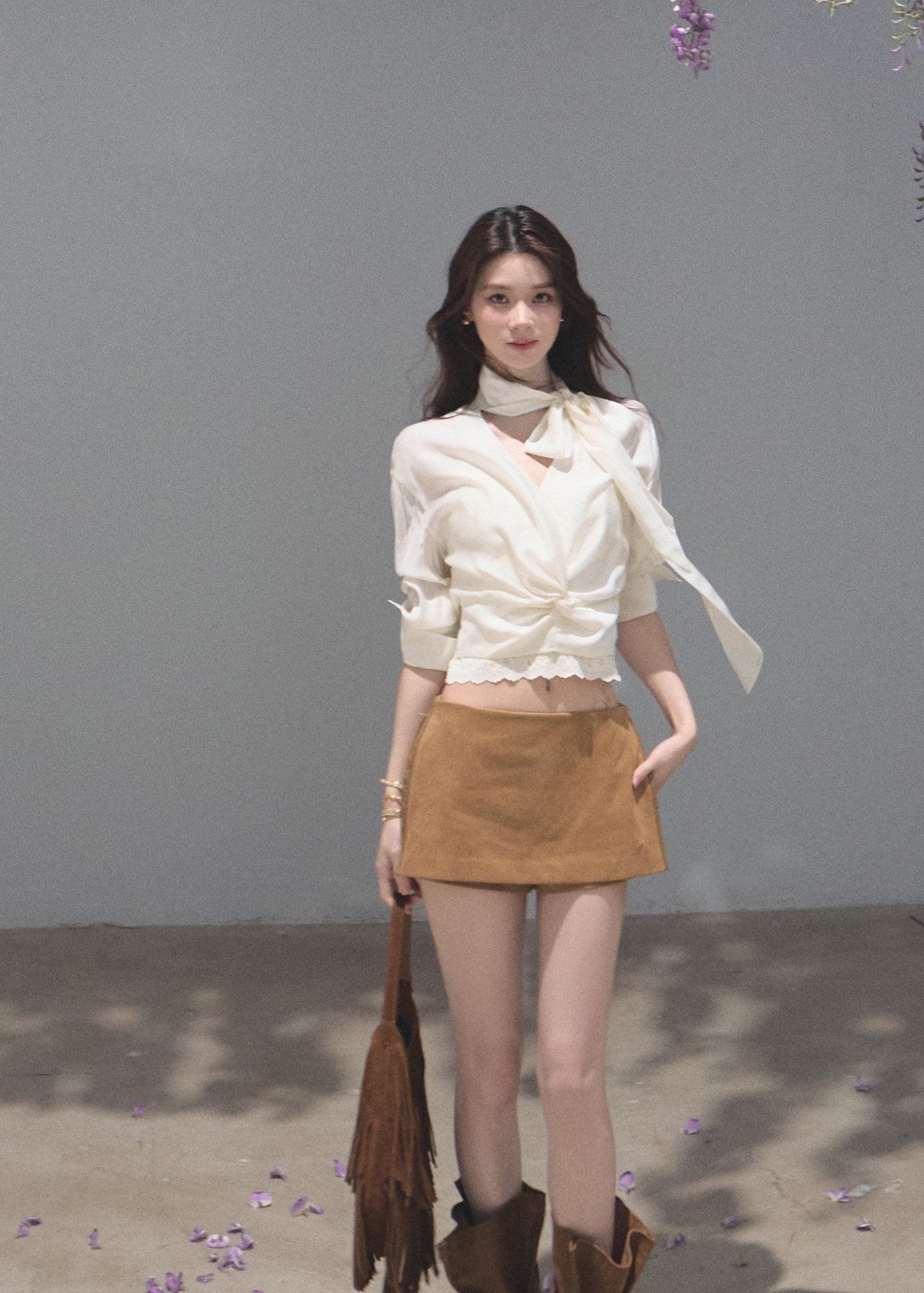 Ivory ribbon-tie cropped blouse with a softly gathered waist