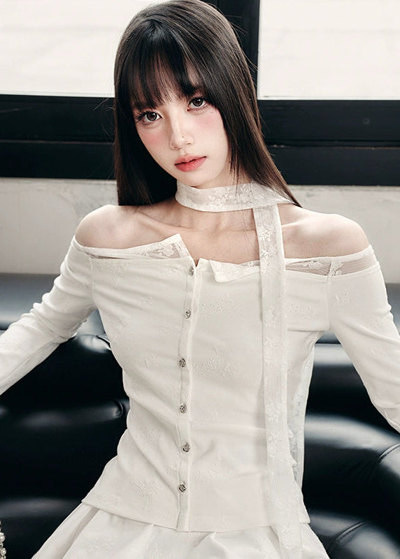 Ethereal and composed, the White Moonlight Sonata Set embodies Fragileheart’s quiet-luxury vision. The off-shoulder lace top and embroidered skirt whisper of moonlit evenings and polished confidence. Soft satin sheen meets delicate tailoring, creating a timeless silhouette that speaks of grace without needing attention.