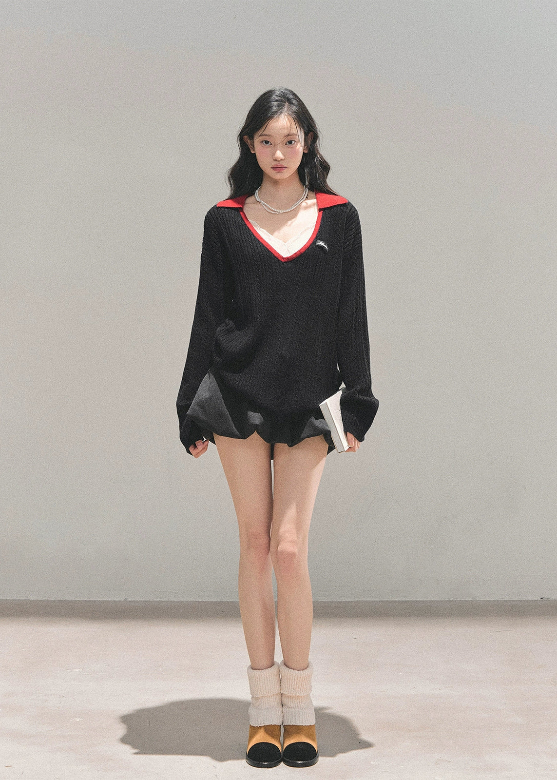 AOMALM sweater, V-neck knit top, college style sweater, Korean fashion sweater, wool knit women's top, winter knit pullover, feminine V-neck sweater, soft wool sweater, black knitted top, winter Korean style outfit, cute warm sweater women, campus style knitwear, deep V-neck pullover, trendy winter tops 2025, elegant knit sweater women, minimal chic sweater, soft warm knit top.