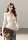 Romantic faux layered V-neck top with decorative front buttons