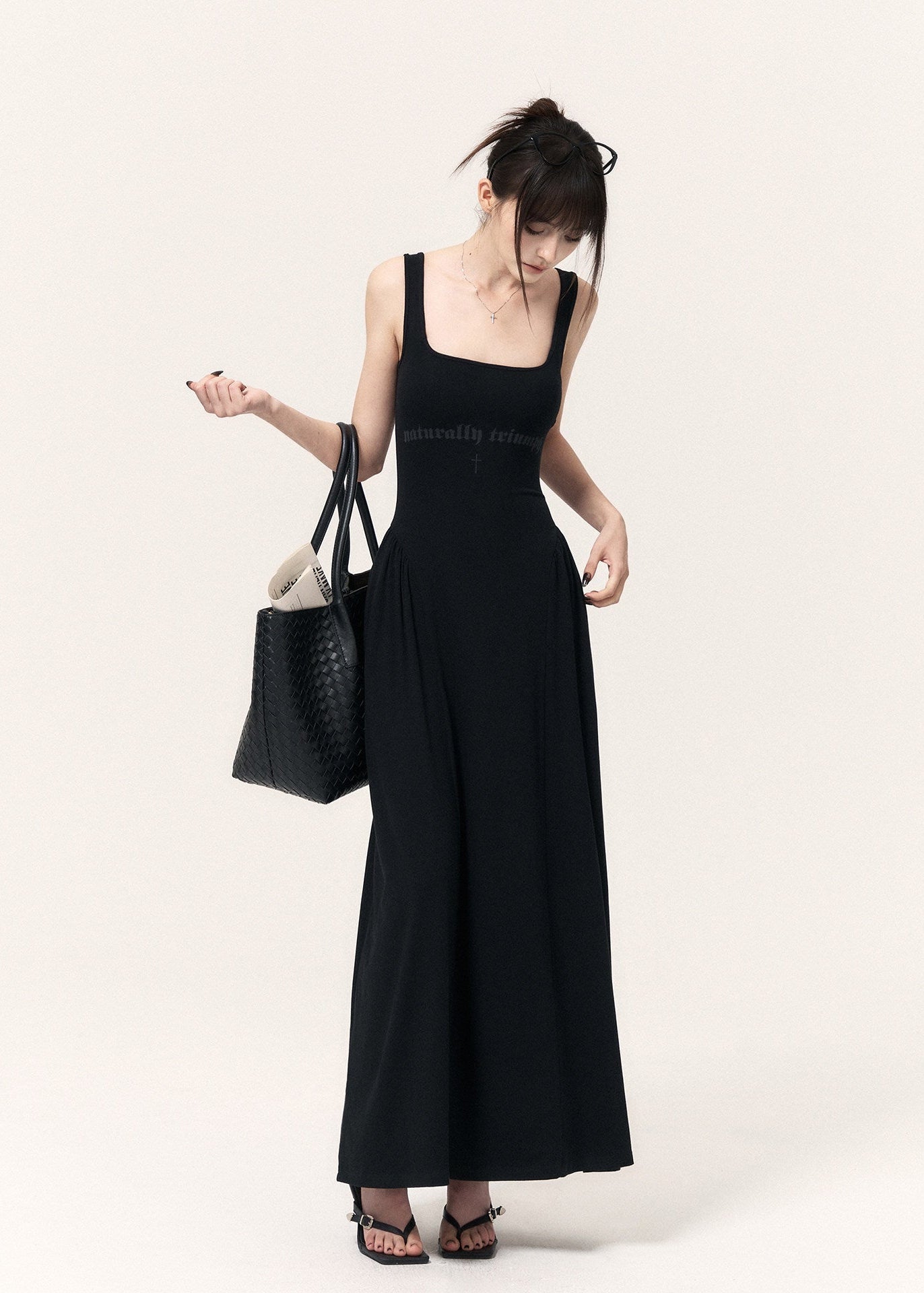 Black cross-print knit maxi dress with cropped pinstriped shrug