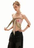Y2K handkerchief top styled with oversized distressed jeans