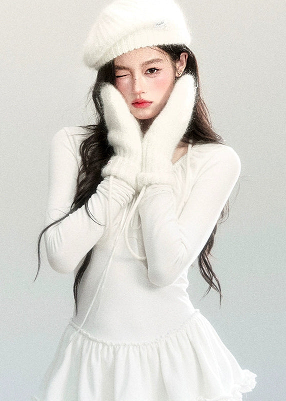 Fragileheart knit dress, ballet style outfit, ivory ruffle one-piece, luxury Korean fashion, quiet luxury womenswear, pastel noir aesthetic, elegant autumn dress, V-neck knit outfit, pre-autumn K-fashion, romantic feminine style, tiered ruffle skirt, soft Korean fashion, delicate white dress, graceful knit one-piece
