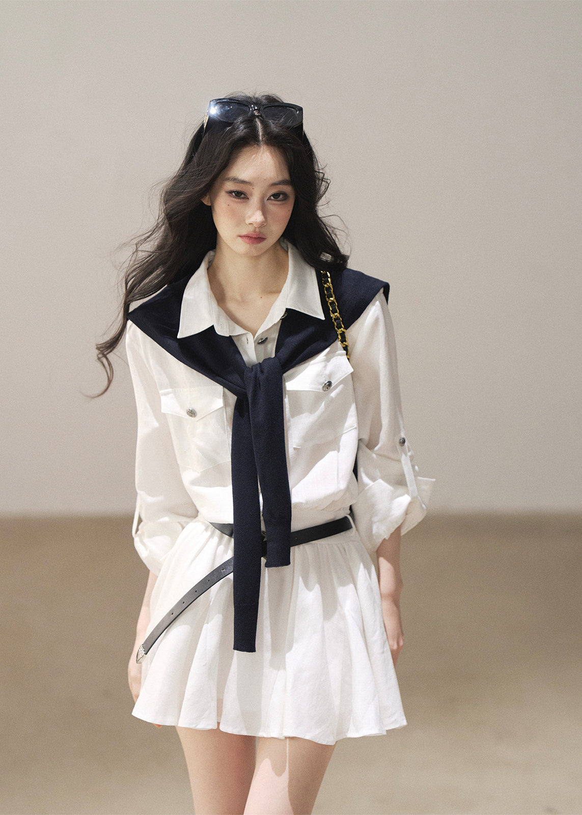 White long sleeve dress with dark shoulder shawl