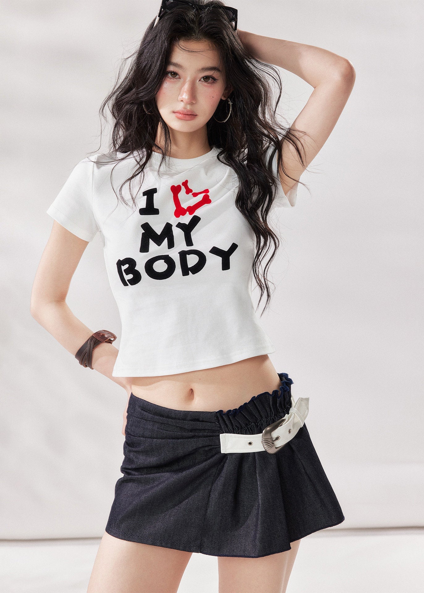 high waist mini skirt, belted mini skirt women, shirred waist skirt, irregular a line skirt, white mini skirt, black mini skirt, american style skirt, summer skirt women, korean fashion skirt, stylish casual skirt, trendy summer outfit, city style outfit women