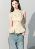 Fitted high-neck top with a flared ruffle waist