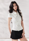 white denim shirt women, double breasted shirt women, doll collar blouse, french style summer shirt, short sleeve denim top, structured white top, chic summer outfit women, korean fashion blouse, modern casual shirt, elevated everyday top