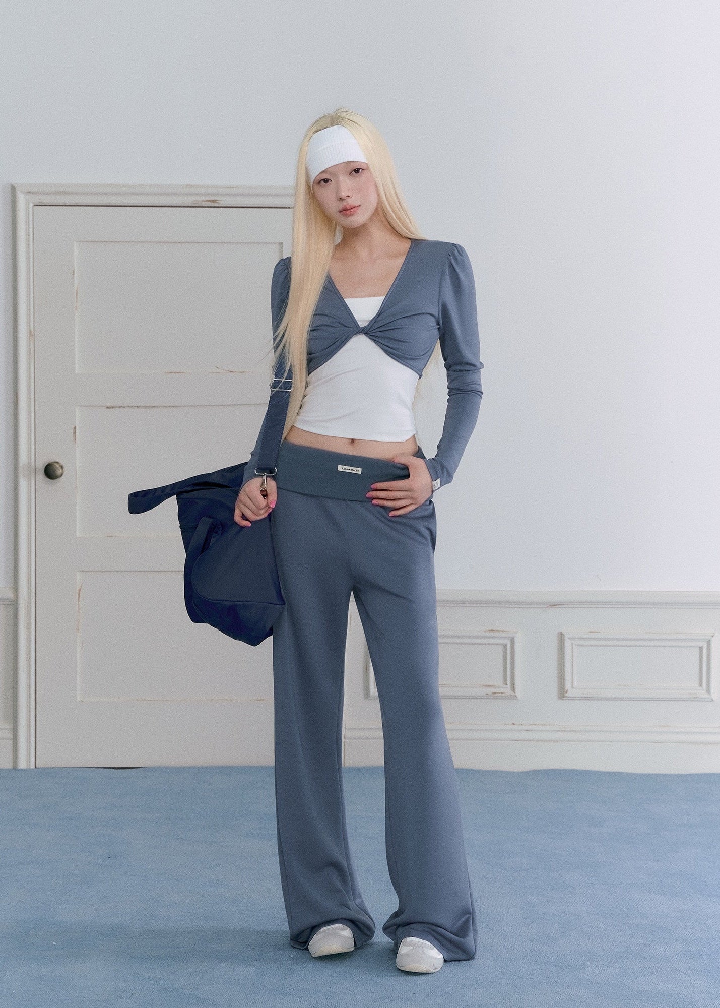 Women’s ballet-style fitted top and relaxed casual pants matching set