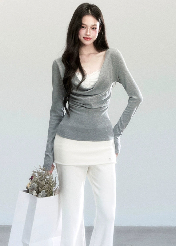 Fragileheart knit top, draped swing blouse, luxury Korean fashion, lace layered knitwear, quiet luxury womenswear, pastel noir aesthetic, grey slim-fit top, elegant autumn outfit, K-fashion 2025, minimalist feminine fashion, modern Korean style, soft two-piece knit, delicate off-shoulder top, refined knit blouse
