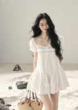 Romantic white mini dress with lace-trim detail