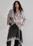 JNYLON asymmetric long shirt women, Korean stylish lace stripe blouse, modern Korean fashion long shirt, chic ruffle stripe layering piece, vintage inspired lace long blouse, trendy Korean street chic outfit, lightweight striped long shirt women, urban Korean fashion layering top, stylish oversized long blouse Korean style, lace applique long shirt women