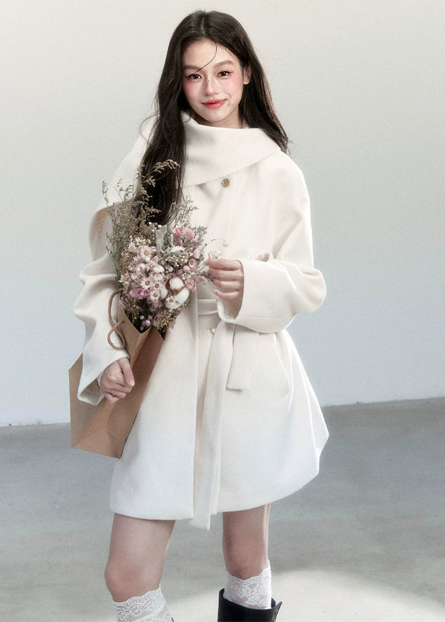 Fragileheart wool coat, scarf collar jacket, ivory belted coat, luxury Korean fashion, quiet luxury outerwear, pastel noir aesthetic, elegant winter coat, K-fashion 2025, soft feminine style, minimalist wool wrap, chic winter outfit, modern elegant outerwear, white long coat, sophisticated Korean womenswear
