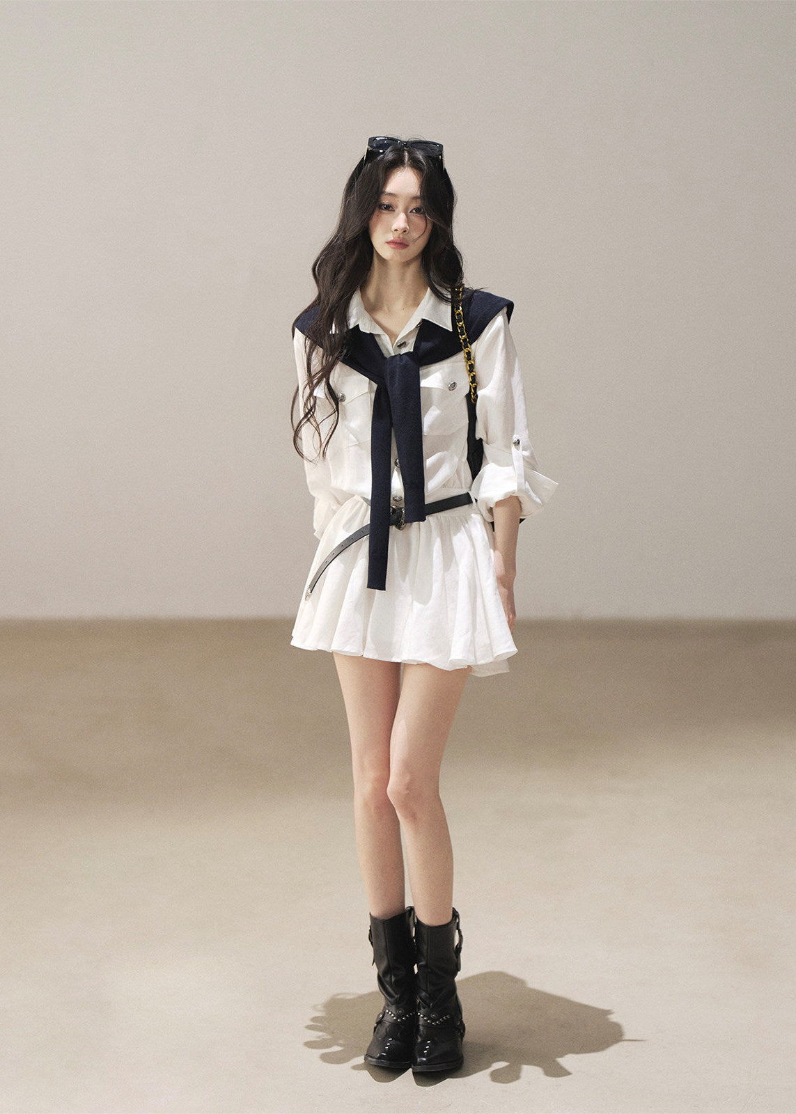 White long sleeve dress with dark shoulder shawl